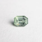 Load image into Gallery viewer, 0.77ct 5.67x4.23x3.38mm Cut Corner Rectangle Step Cut Sapphire 23705-08
