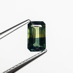 Load image into Gallery viewer, 0.90ct 6.94x4.21x2.77mm Cut Corner Rectangle Step Cut Sapphire 23803-02
