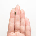 Load image into Gallery viewer, 0.85ct 8.45x3.22x2.61mm Rectangle Step Cut Sapphire 25740-03
