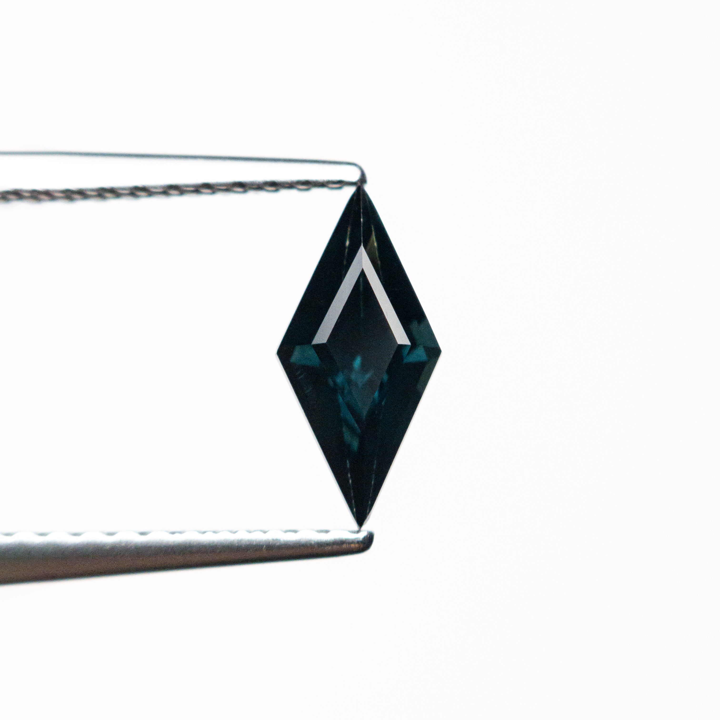 0.64ct 9.14x4.41x3.12mm Lozenge Step Cut Sapphire 25740-07