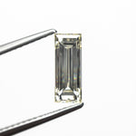 Load image into Gallery viewer, 1.11ct 9.55x3.80x2.97mm VS2 O-P Baguette Step Cut 26124-02
