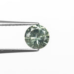 Load image into Gallery viewer, 0.76ct 5.55x5.22x3.43mm Round Brilliant Sapphire 26134-03
