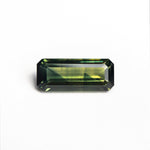 Load image into Gallery viewer, 1.15ct 9.56x3.99x2.49mm Cut Corner Rectangle Step Cut Sapphire 26336-05
