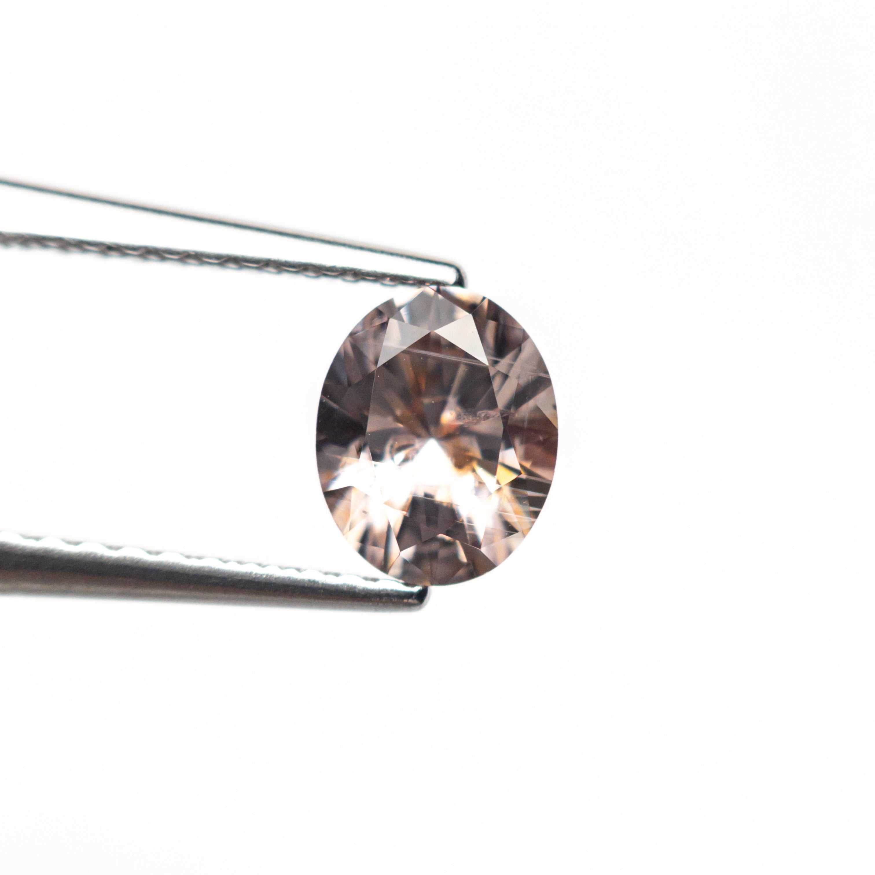 0.90ct 6.43x5.21x3.65mm Oval Brilliant Sapphire 26668-06