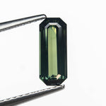 Load image into Gallery viewer, 1.09ct 9.35x3.86x2.69mm Cut Corner Rectangle Step Cut Sapphire 27329-02
