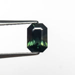 Load image into Gallery viewer, 0.70ct 6.26x4.38x3.17mm Cut Corner Rectangle Step Cut Sapphire 27336-27
