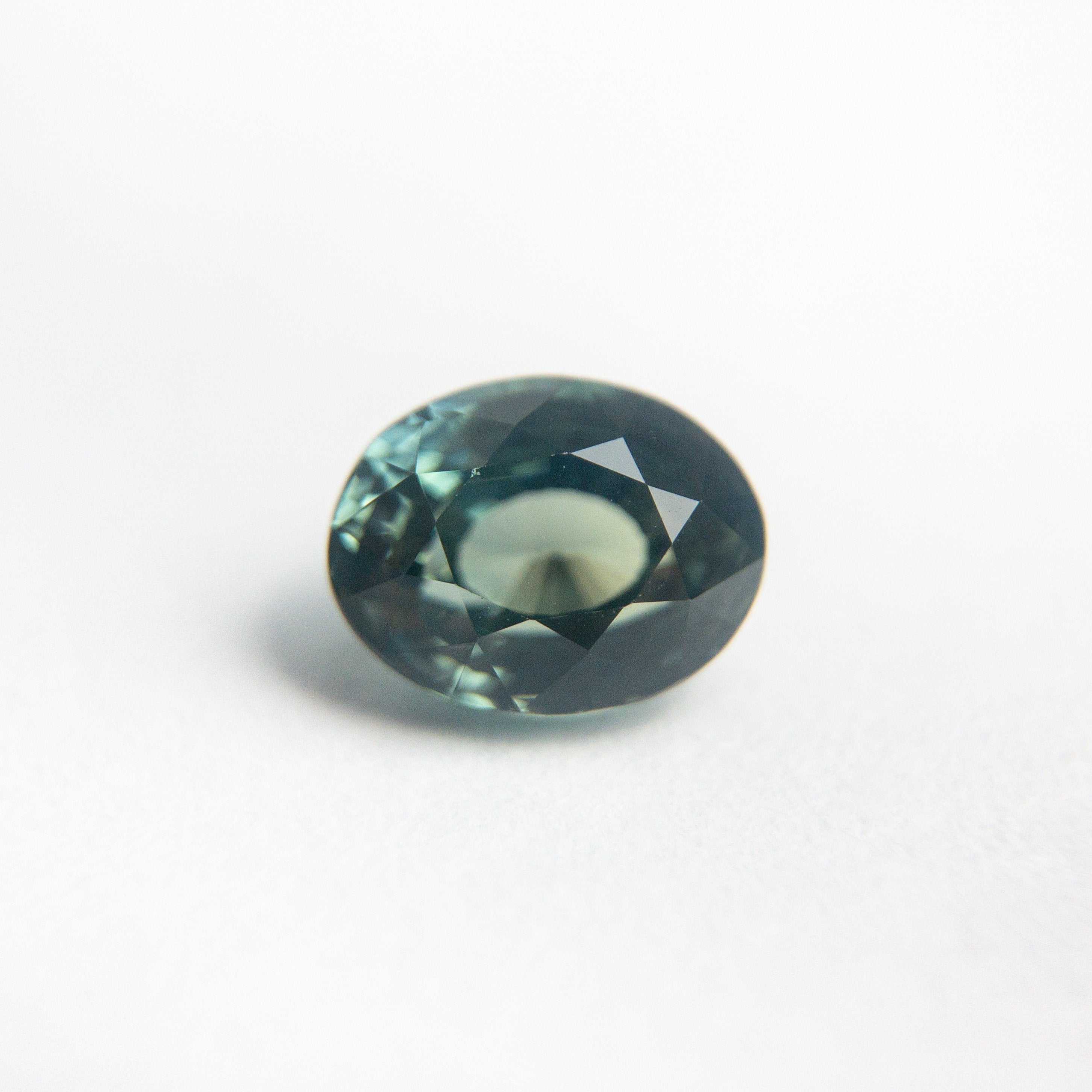 1.29ct 6.78x5.35x4.15mm Oval Brilliant Cut Sapphire 19037-08 - Misfit Diamonds