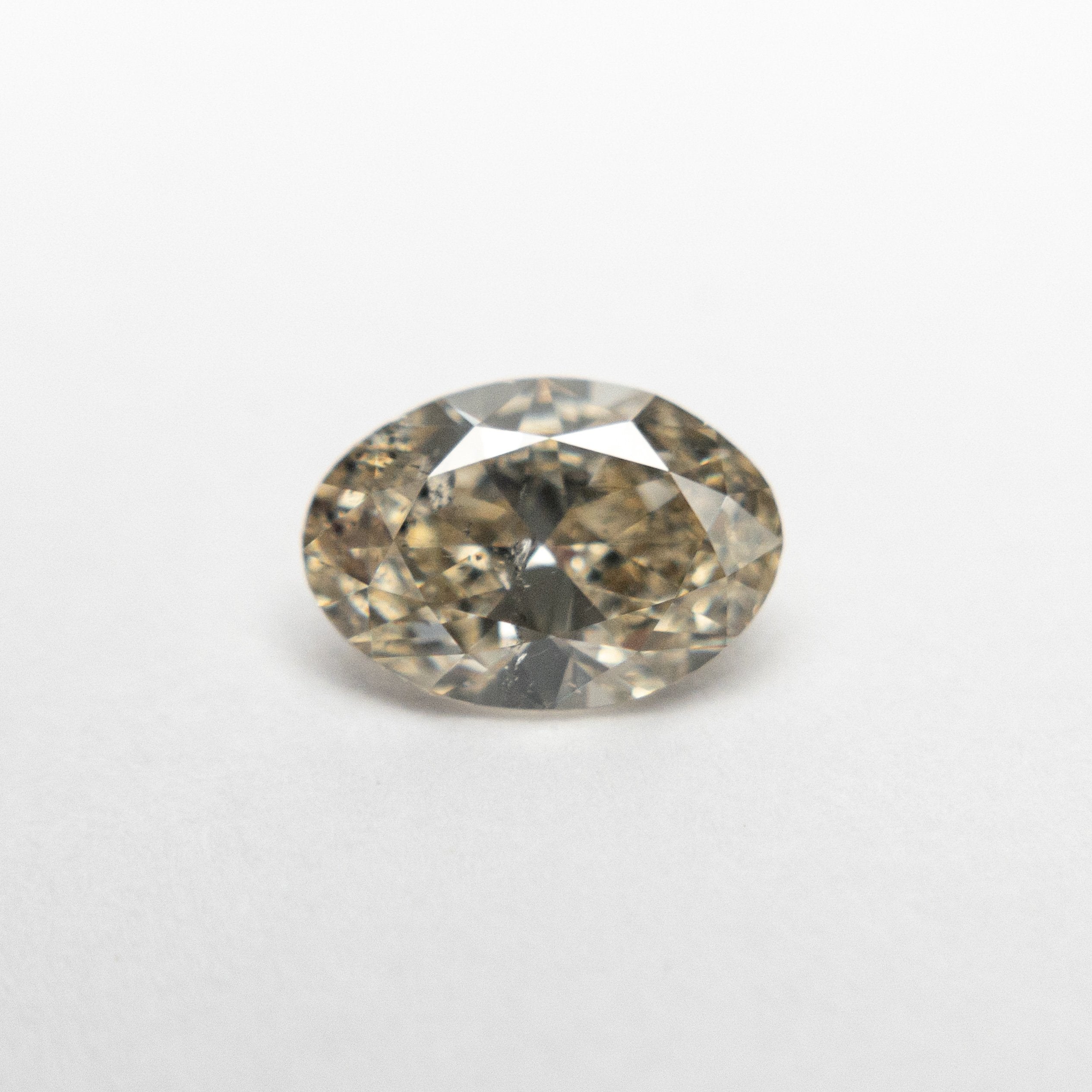 0.66ct 6.93x4.84x2.93mm Oval Brilliant 19163-68 🇨🇦 - Misfit Diamonds