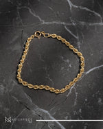 Load image into Gallery viewer, 18K Yellow Gold Rope Bracelet
