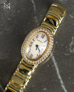 Load image into Gallery viewer, Cartier 18K Yellow Gold Mini Baignoire Factory Diamond Bezel Watch Pre-Owned
