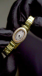 Load and play video in Gallery viewer, Cartier 18K Yellow Gold Mini Baignoire Factory Diamond Bezel Watch Pre-Owned
