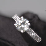 Load and play video in Gallery viewer, 18K White Gold 1.70CT Round Brilliant Diamond Ring with Pavé Side Stones
