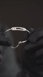 Load and play video in Gallery viewer, 18K White Gold with Moving Do-Re-Mi Diamond Bangle
